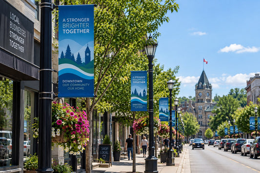 Coordinated municipal and BIA pole banner program along a Canadian downtown streetscape.